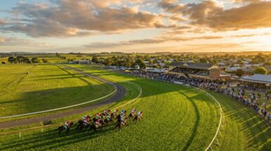 Terang horse racing aerial view with horses on track